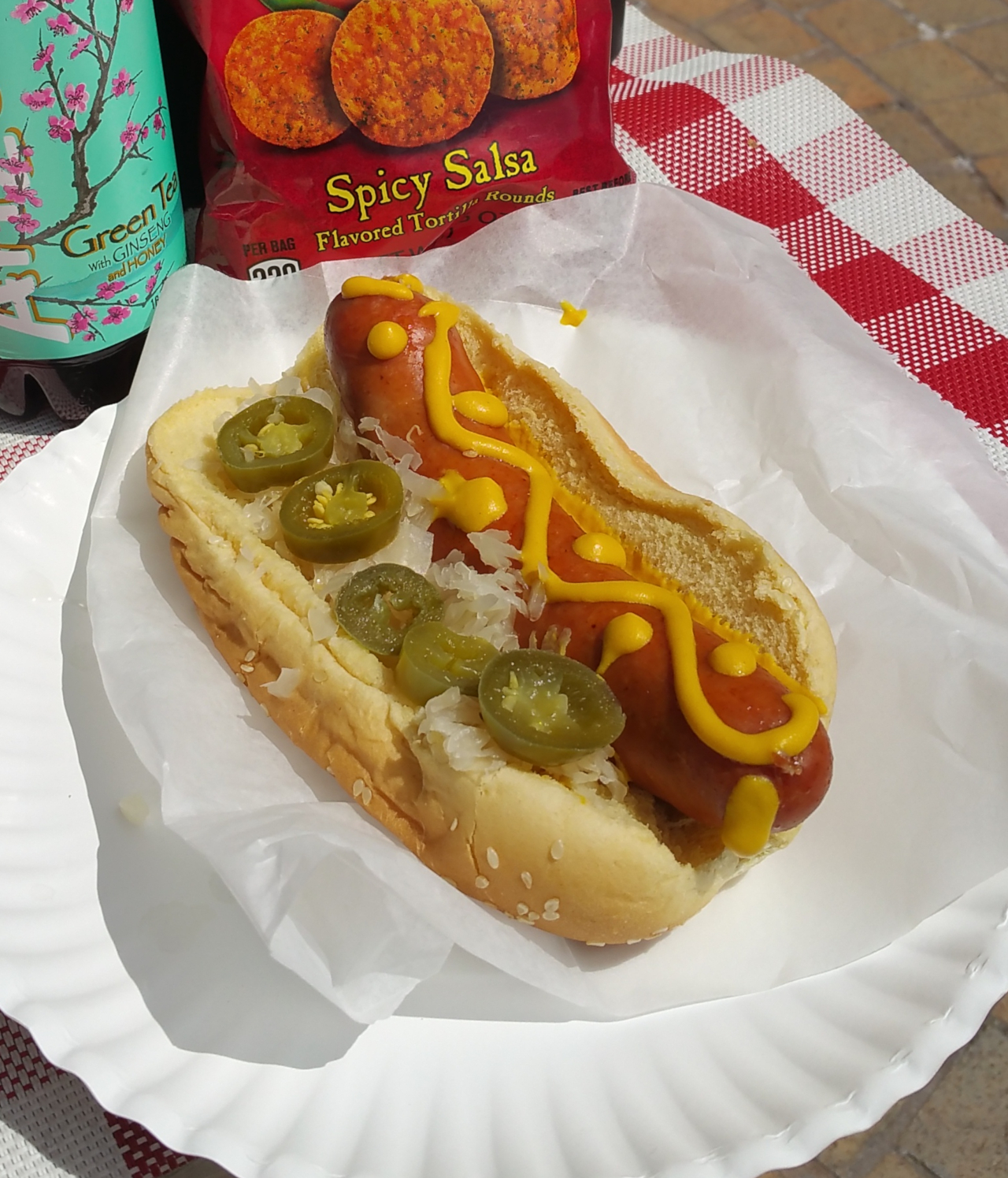 hot dog with mustard jalepeno sauerkraut